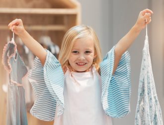 Girl child, choice or change clothes in fashion brand retail store shopping sale happy for buying d