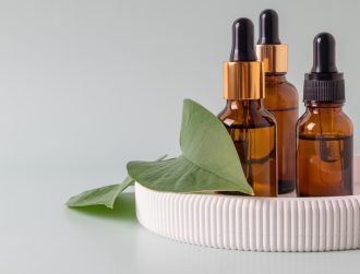 Serum bottles on ceramic tray. Sustainable lifestyle concept, natural cosmetics. Unbranded Cosmetic